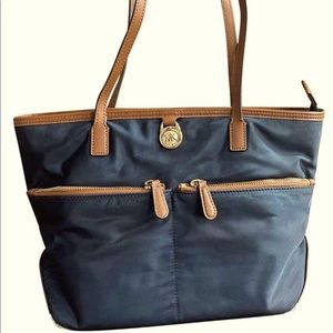 Michael Kors Nylon bag w/Some wear & tear @straps. Inside is in great condition.